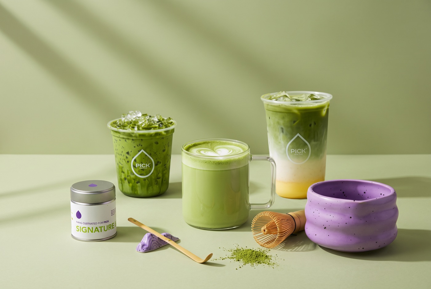 A lineup of PICK matcha drinks